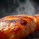 Close-up of a juicy piece of grilled chicken representing flavor.